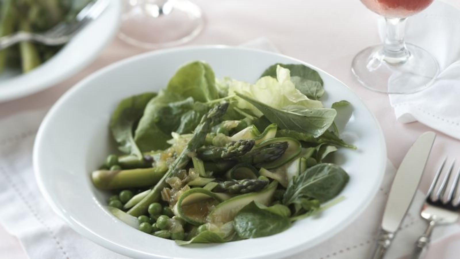 Image of Skinny Spring Vegetable Salad Over Fresh Greens