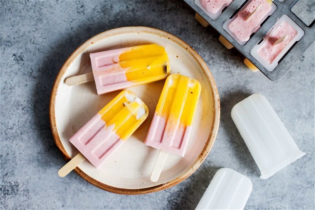 Image of Mango-Strawberry Popsicles with Coconut Chips