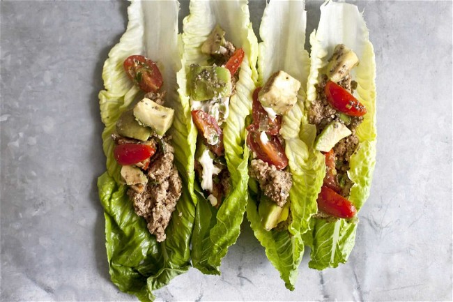 Image of Raw Burritos with Chia Seed Salsa and Spiced Cashew Cream Drizzle
