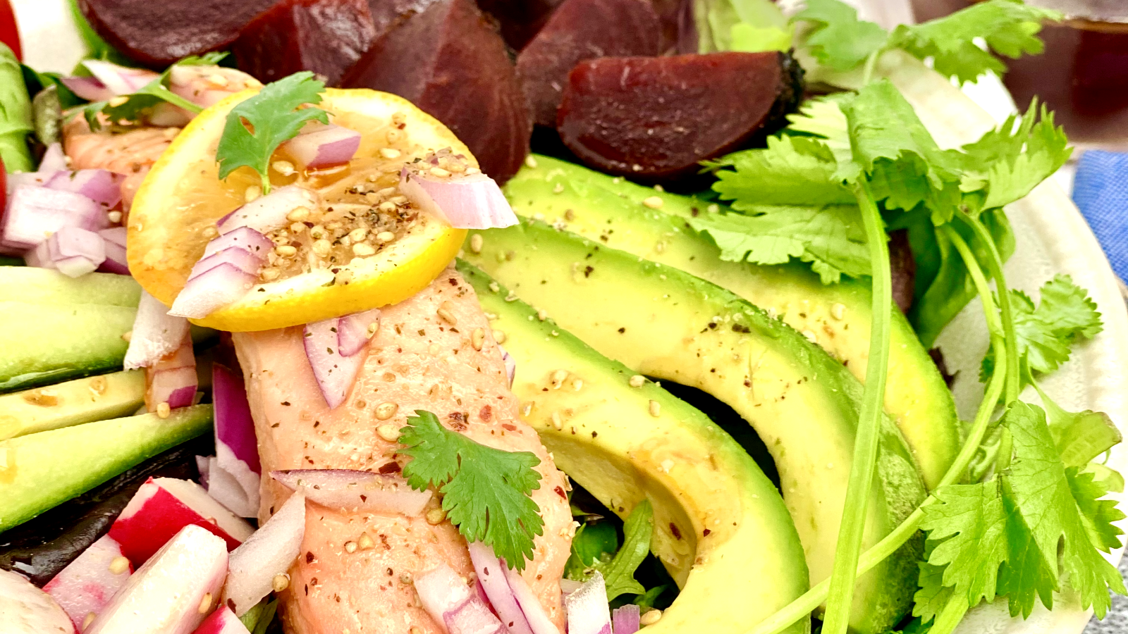 Image of Poached Salmon Salad Bowl with Red Beet Coconut Aminos Dressing