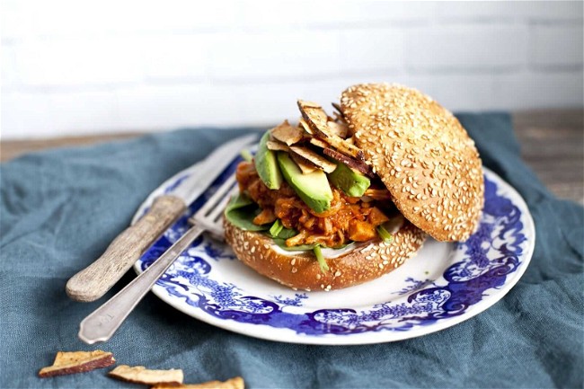 Image of Vegan Pulled Pork Sandwich with Avocado and Spicy Coconut Chips