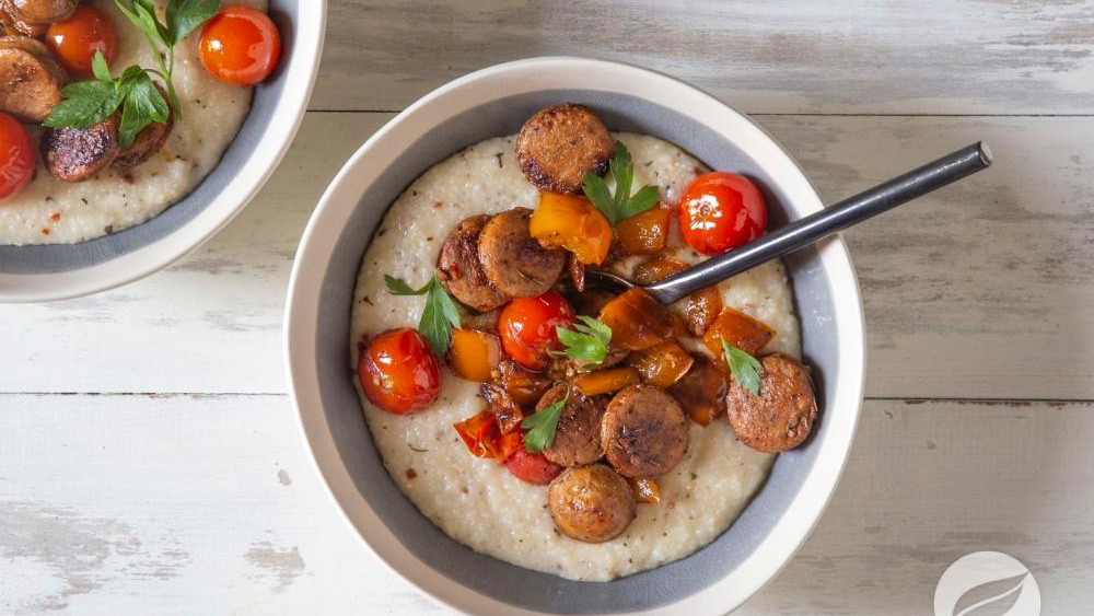 Image of Cheesy Grits with Sausage & Tomatoes