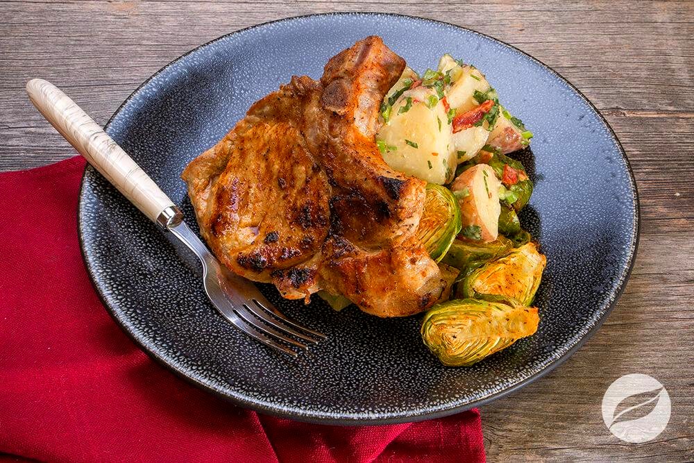 Image of Rodeo Pork Chops with Roasted Brussels Sprouts & Potato Salad