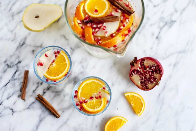 Image of Citrus Sangria with Maple Syrup and Pomegranate