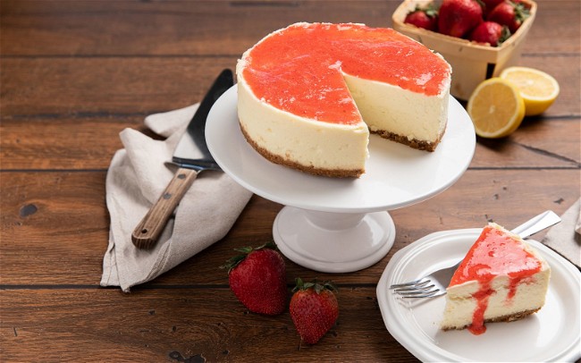 Image of Cheesecake with Strawberry Sauce