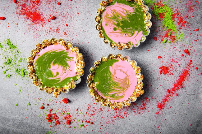 Image of Matcha and Raspberry Swirled Coconut Custard Tartlets