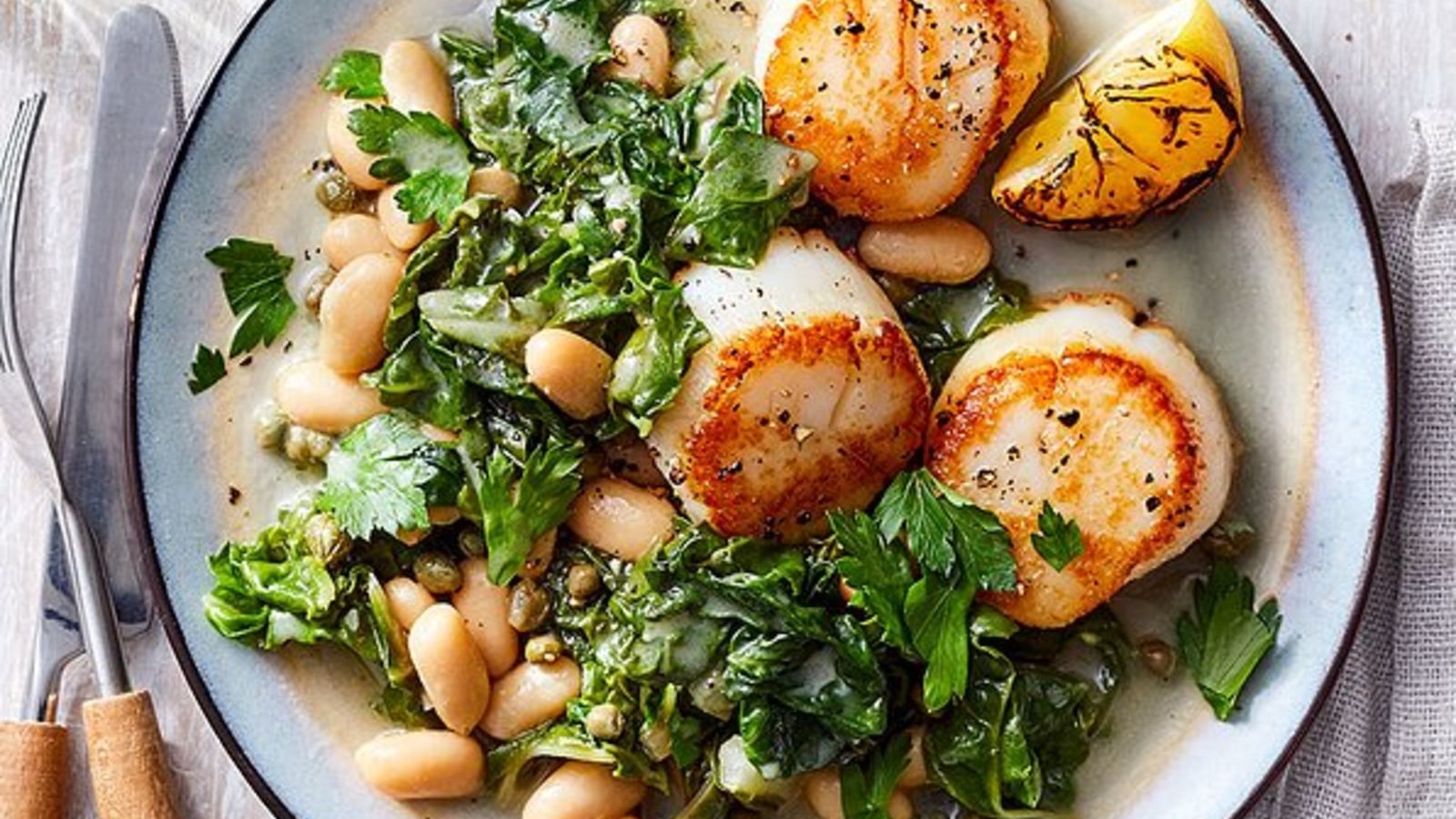 Image of Seared Scallops with White Bean Ragu & Charred Lemon