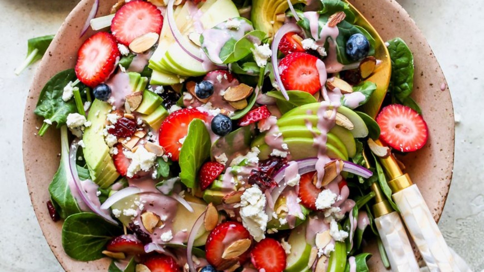 Image of Berry and Spinach Salad with Creamy Strawberry Tahini Dressing