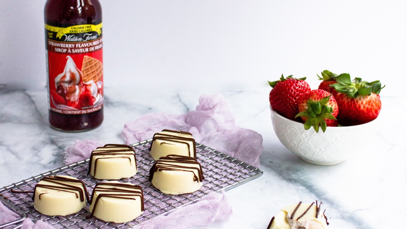 Image of White Chocolate Cheesecake Bites with Strawberry Fruit Spread