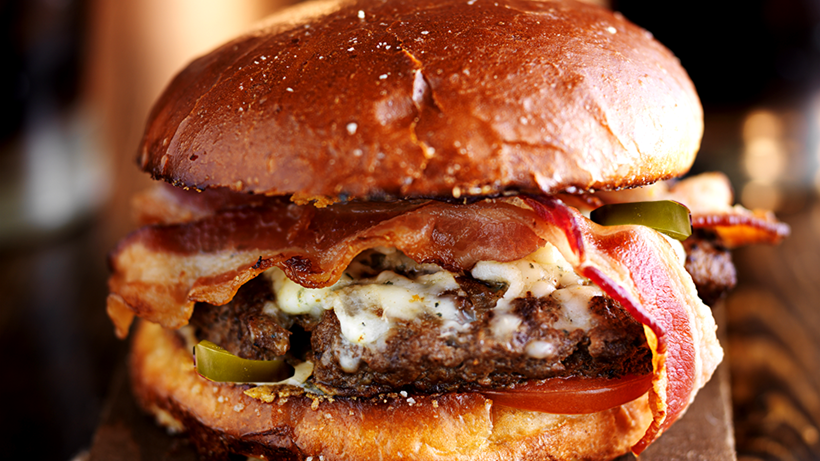 Image of Grilled Jalapeno and Onion Bison Bacon Burger