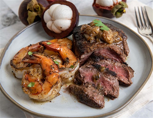 Image of Pan Seared Steak and Shrimp with Mangosteen Pan Sauce