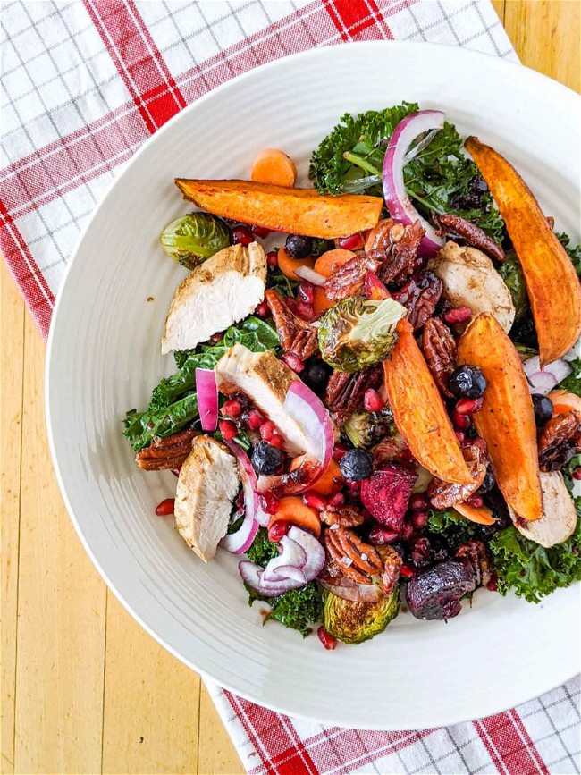 Image of Kale Salad with Blueberry Vinaigrette and Maple Pecans